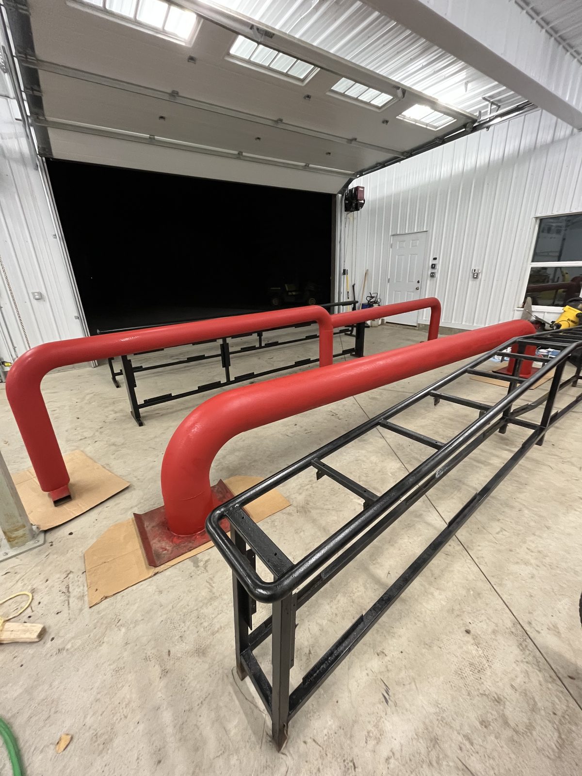Custom red rail fabricated in the shop